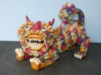 601 · A MAJOLICA GLAZED CHINESE FOO