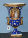 617 · AN ORMOLU MOUNTED HAND PAINTED