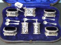 657 · 7 PIECE STERLING SILVER CONDIM
