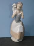 671 · NAO FIGURE OF A GIRL WITH LAMB