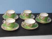 700 · VICTORIAN TEA CUPS & SAUCERS