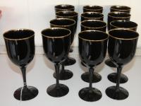 708 · SET OF 13 BLACK GLASS STEMMED