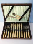 728 · A MAHOGANY CASED ODD FISH SERV