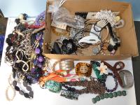 734 · BOX OF COSTUME JEWELLERY