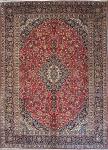 1004 · A SOLID PERSIAN KASHAN CARPET