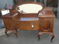 1029 · A BLACKWOOD BOW FRONT MIRROR B