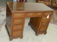 1032 · A DIMINUTIVE WALNUT KNEEHOLE D
