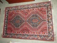 1046 · HANDSTITCHED TRIBAL FLOOR RUG