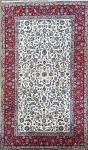 1062 · A FINELY HAND-KNOTTED WOOLLEN-