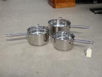 1201 · 3 GRADUATED SAUCEPANS WITH LID