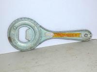 1415 · VINTAGE DUNLOP BOTTLE OPENER -