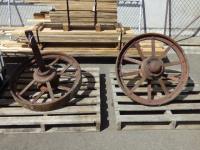 1881 · PAIR OF LARGE CAST IRON IMPLEM