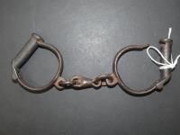 621 · PAIR OF 19th CENTURY HANDCUFFS