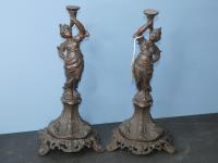 707 · PAIR OF METAL FIGURINES OF TRU