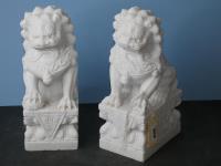 PAIR OF CARVED STONE FOO DOGS