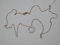 891 · FINE 9CT GOLD CHAIN WITH DIAMO