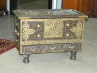 1028 · A TEAK BRASS STUDDED ZANZIBAR