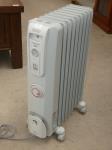 1146 · DELONGHI COLUMN HEATER - GOING