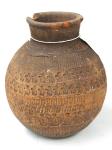 84 · A TRIBAL EARTHENWARE BEER/WATE
